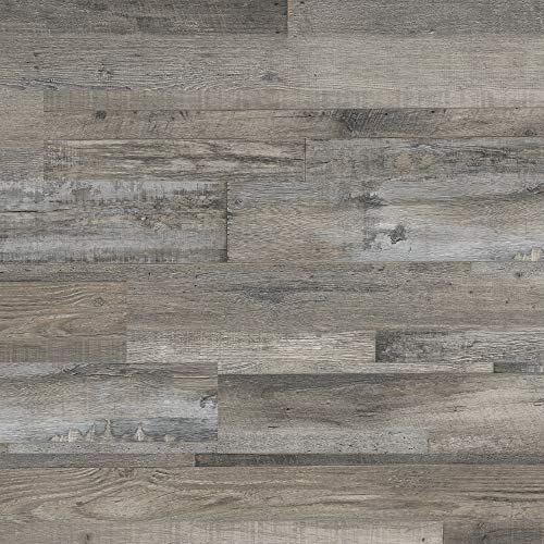 Best Vinyl Click Flooring Brands and Prices (2026 Buyer's Guide) Dark gray luxury vinyl click flooring planks installed in a living room