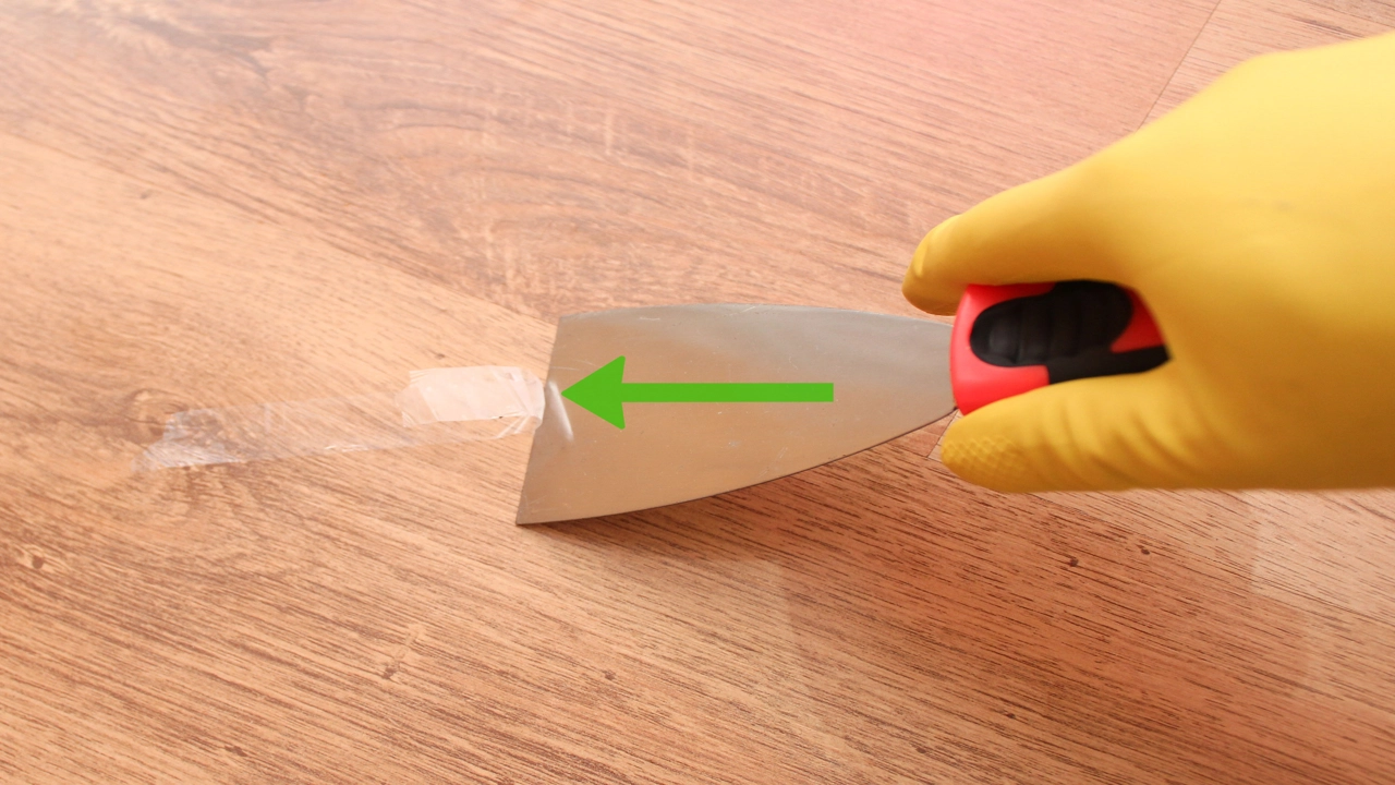 how to remove glue from tile floor